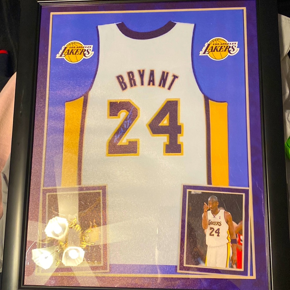 Not a actual framed jersey it’s a framed poster